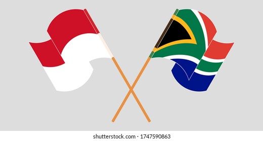 Banderas cruzadas y ondeando banderas de Indonesia y los ASR