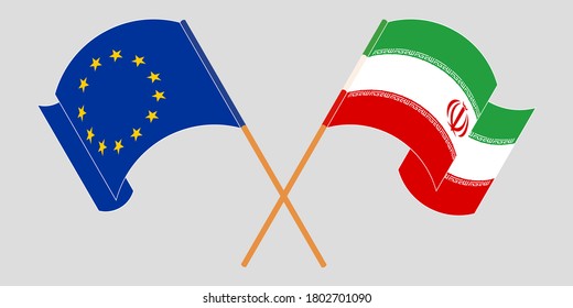 Banderas cruzadas y ondeando banderas de Irán y la UE