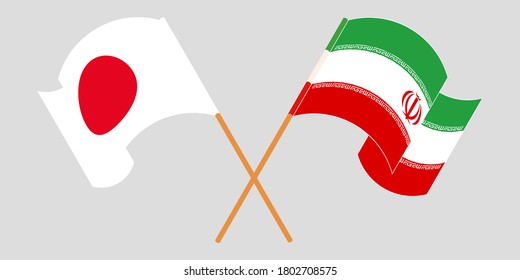 Crossed and waving flags of Iran and Japan