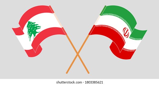Crossed and waving flags of Iran and Lebanon