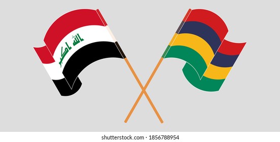Crossed and waving flags of Iraq and Mauritius