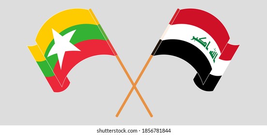 Crossed and waving flags of Iraq and Myanmar