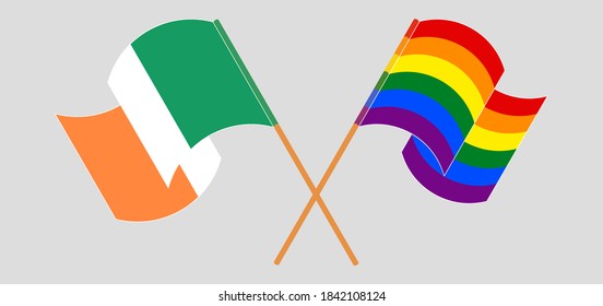 Crossed and waving flags of Ireland and LGBTQ