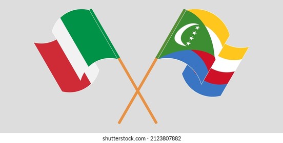 Crossed and waving flags of Italy and Comoros. Vector illustration
