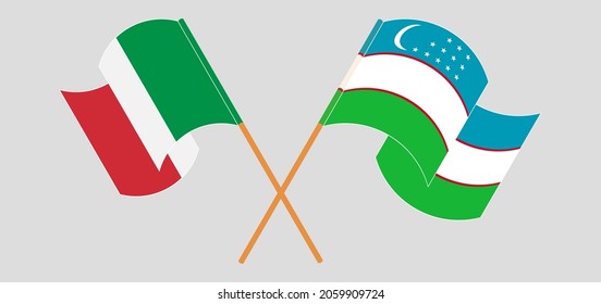 Crossed and waving flags of Italy and Uzbekistan