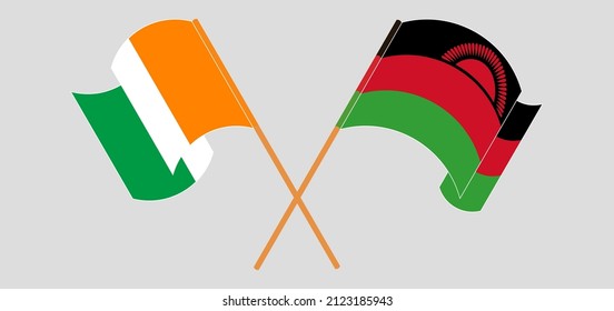Überquerte und wehende Flaggen von Côte d'Ivoire und Malawi. Vektorgrafik
