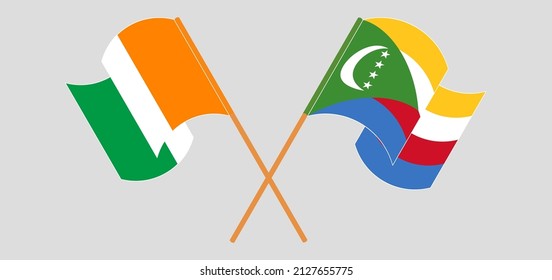 Cruzada y ondeando banderas de Costa de Marfil y Comoras. Ilustración del vector

