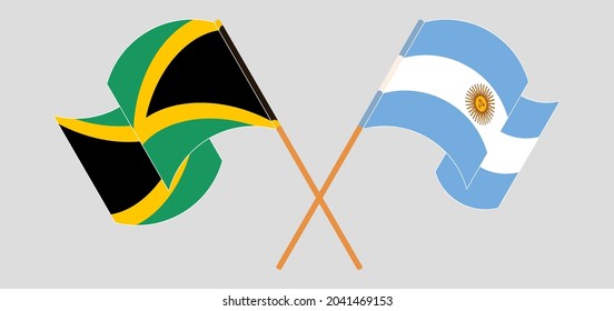 Crossed and waving flags of Jamaica and Argentina