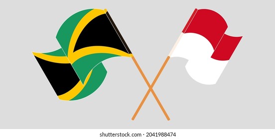 Crossed and waving flags of Jamaica and Monaco