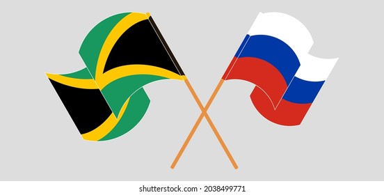 Crossed and waving flags of Jamaica and Russia