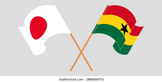 Crossed and waving flags of Japan and Ghana