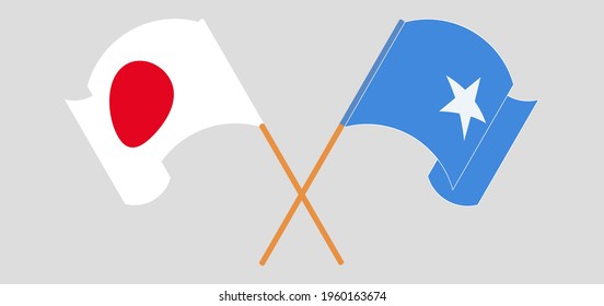 Crossed and waving flags of Japan and Somalia