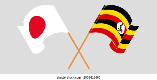 Crossed and waving flags of Japan and Uganda