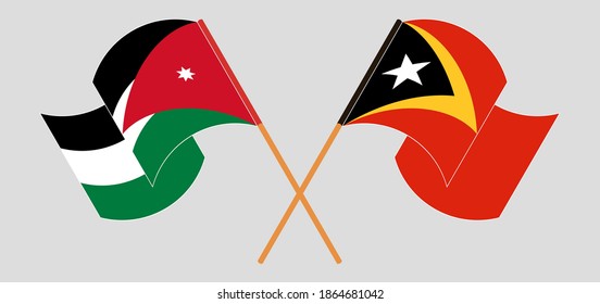Crossed and waving flags of Jordan and East Timor