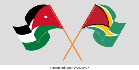 Crossed and waving flags of Jordan and Guyana
