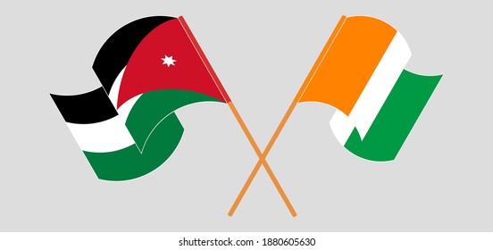 Crossed and waving flags of Jordan and Republic of Ivory Coast