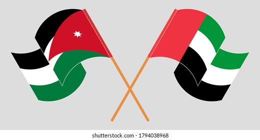 Crossed and waving flags of Jordan and the United Arab Emirates