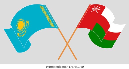 Crossed and waving flags of Kazakhstan and Oman