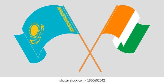 Crossed and waving flags of Kazakhstan and Republic of Ivory Coast