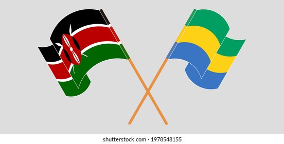 Crossed and waving flags of Kenya and Gabon