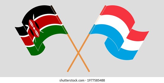 Crossed and waving flags of Kenya and Luxembourg