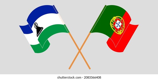 Crossed and waving flags of Kingdom of Lesotho and Portugal. Vector illustration
