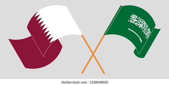 Crossed and waving flags of the Kingdom of Saudi Arabia and Qatar