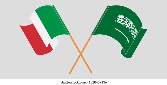 Crossed and waving flags of the Kingdom of Saudi Arabia and Italy