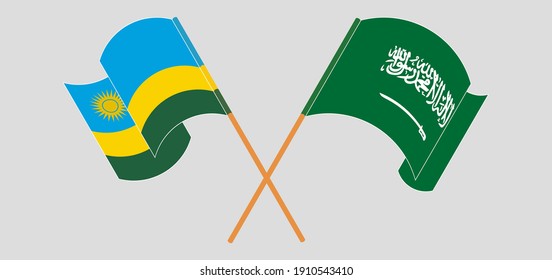 Crossed and waving flags of the Kingdom of Saudi Arabia and Rwanda