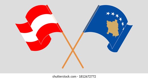 Crossed and waving flags of Kosovo and Austria