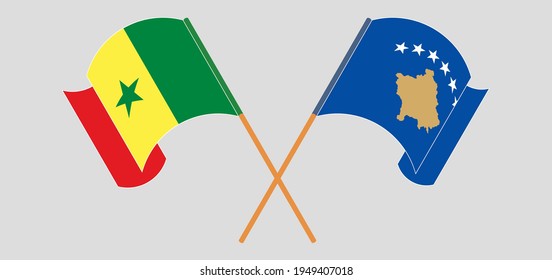 Crossed and waving flags of Kosovo and Senegal