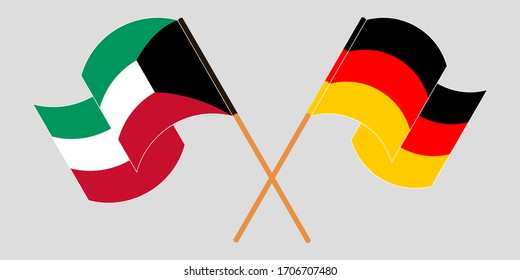 Crossed and waving flags of Kuwait and Germany