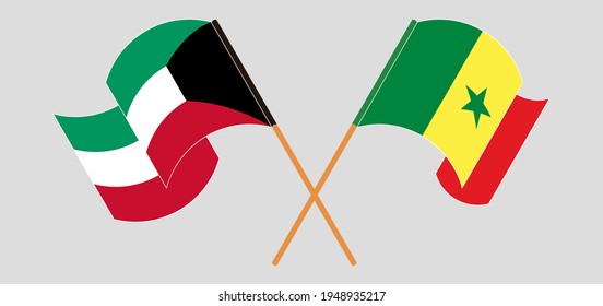 Gekreuzte und wehende Flaggen Kuwaits und Senegals