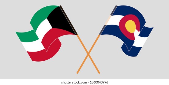 Crossed and waving flags of Kuwait and The State of Colorado
