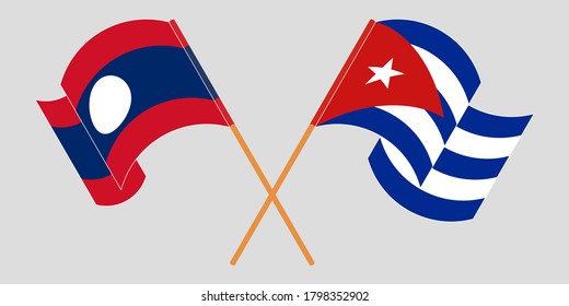 Crossed and waving flags of Laos and Cuba