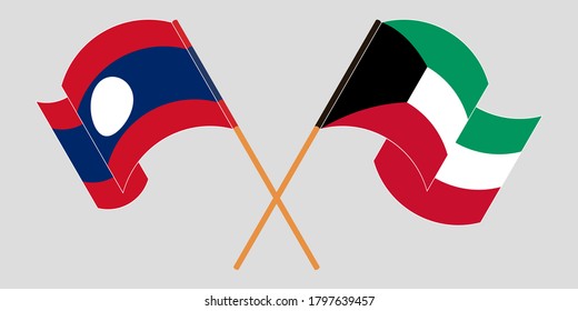 Crossed and waving flags of Laos and Kuwait