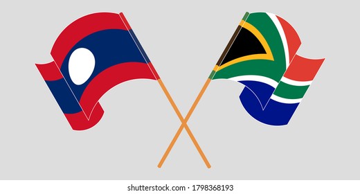 Crossed and waving flags of Laos and Republic of South Africa