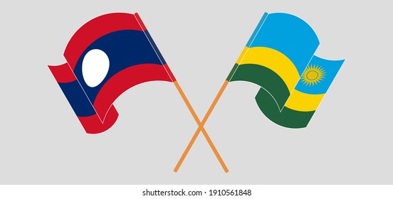 Crossed and waving flags of Laos and Rwanda