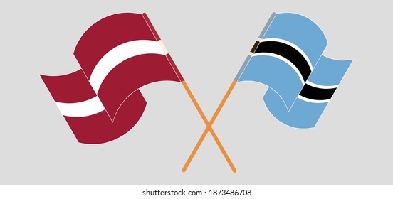 Crossed and waving flags of Latvia and Botswana