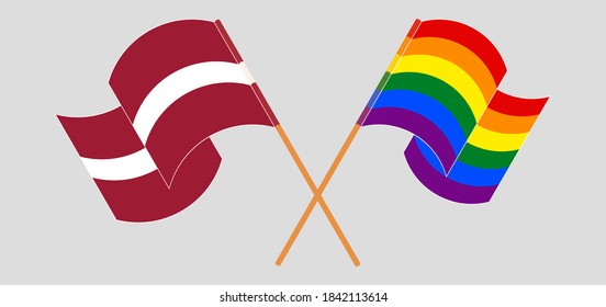 Crossed and waving flags of Latvia and LGBTQ