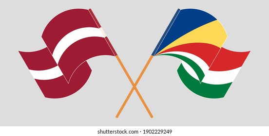Crossed and waving flags of Latvia and Seychelles
