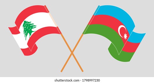 Crossed and waving flags of Lebanon and Azerbaijan
