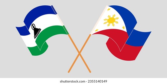 Crossed and waving flags of Lesotho and the Philippines. Vector illustration
