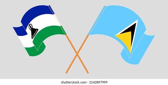 Crossed and waving flags of Lesotho and Saint Lucia