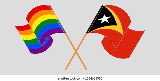 Crossed and waving flags of LGBTQ and East Timor