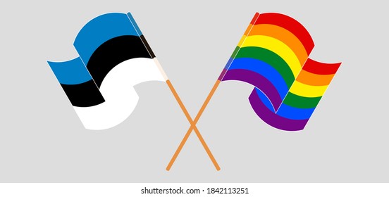 Crossed and waving flags of LGBTQ and Estonia