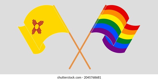 Crossed and waving flags of LGBTQ and the State of New Mexico