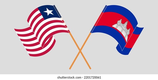 Crossed and waving flags of Liberia and Cambodia. Vector illustration
