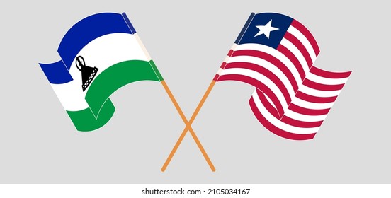 Crossed and waving flags of Liberia and Lesotho. Vector illustration
