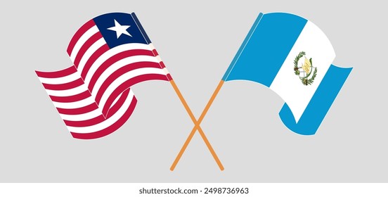 Crossed and waving flags of Liberia and Republic of Guatemala. Vector illustration
